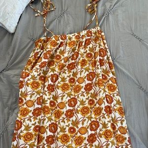 This is a summer dress, that can be worn with a Jean jacket